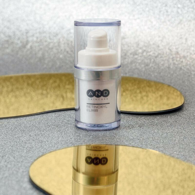 Retinoxyl Elixir (Retinal-Serum) dekoriert mit goldenen Spiegeln.